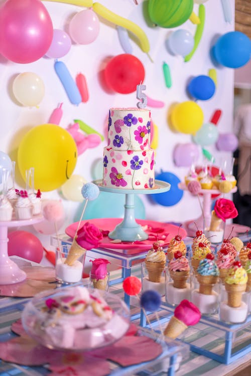 Balloons and Decorations around Birthday Cake