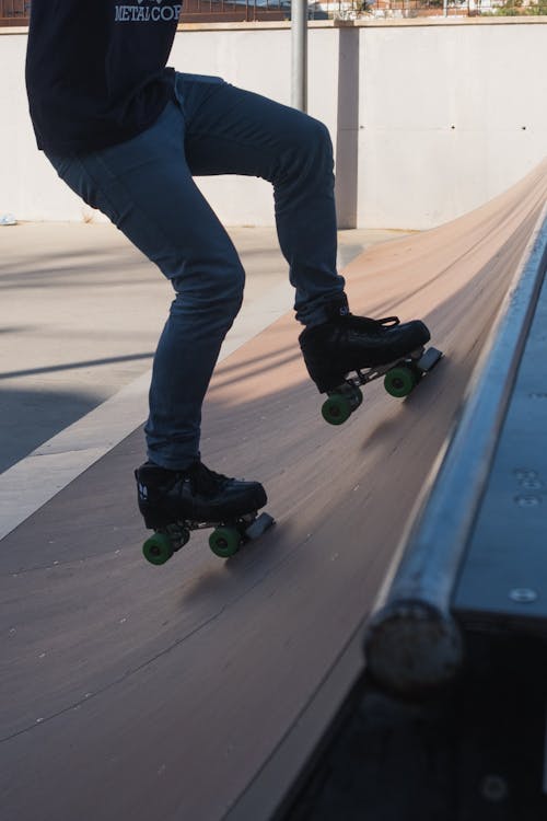 Legs of Person Roller Skating