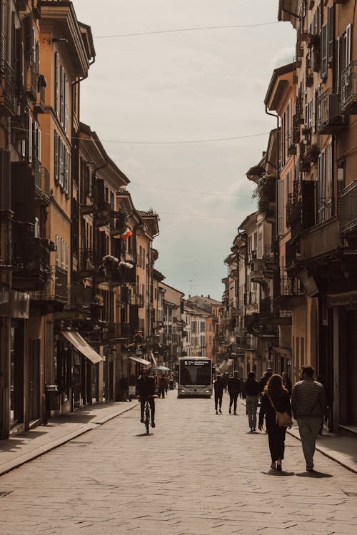 People Walking on Street in Town