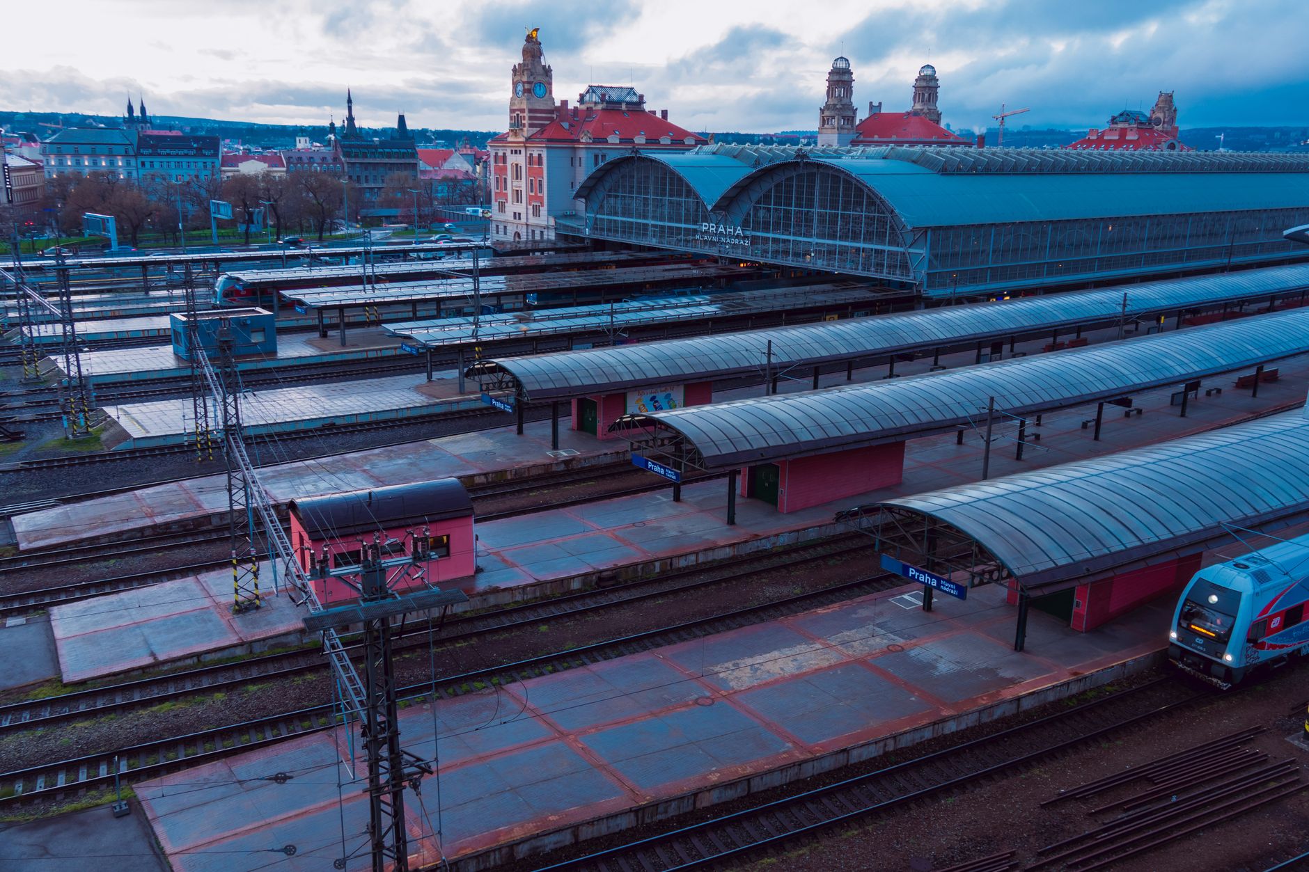 Prague main station platforms at dawn  europe train station tips for fast transfers