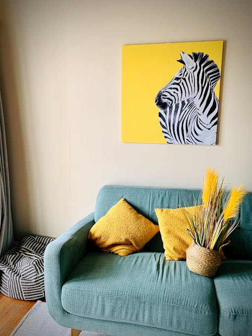 Living Room in with Yellow Pillows and Turquoise Sofa