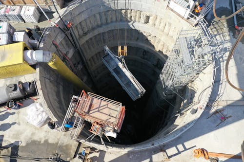 Foto profissional grátis de construção, iluminado pelo sol, indústria