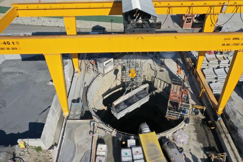 Free High-angle aerial view of a construction site in Eyüpsultan, Istanbul, featuring industrial equipment and workers. Stock Photo