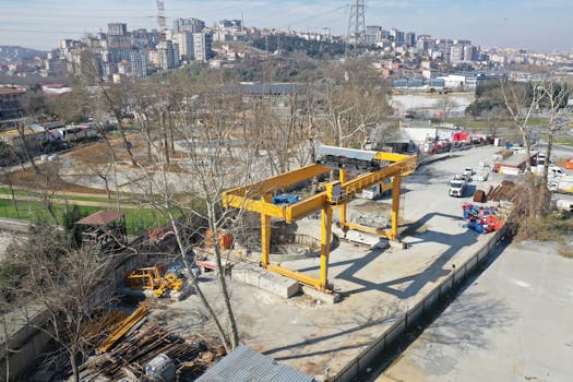 Aerial shot of a construction site in Eyüpsultan, Istanbul with urban background.