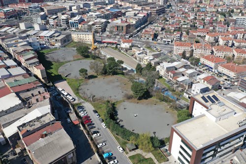 Gratis stockfoto met bomen, dronefoto, gebouwen