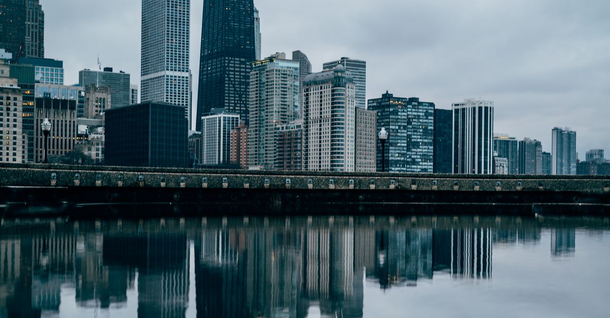 Body Of Water Near High-rise Buildings · Free Stock Photo