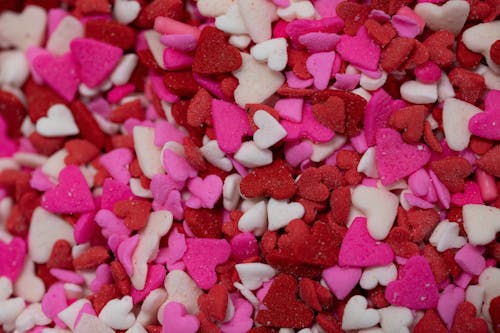 Close-up of Heart Shaped Candy in Red, Pink and White Colors