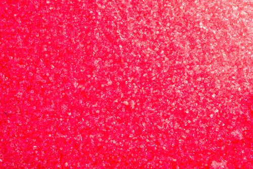 Free Close-up of vibrant pink crystals forming a textured background. Stock Photo