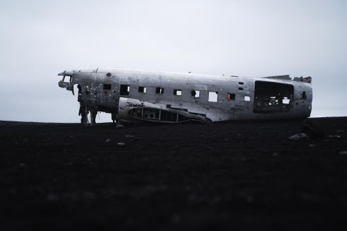 Free Famous abandoned plane wreck on a desolate Icelandic black beach. Stock Photo