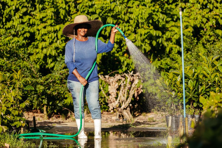 Black woman garden hose