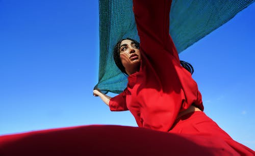 Woman Posing in a Red Costume 