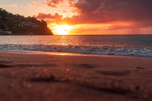 Foto profissional grátis de pôr do sol, por do sol da praia, pôr do sol dourado