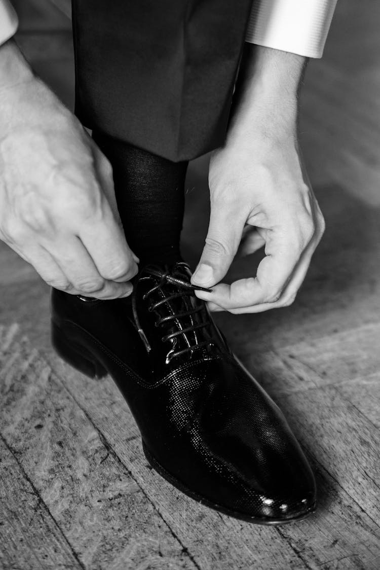 Hands Tying Shoe