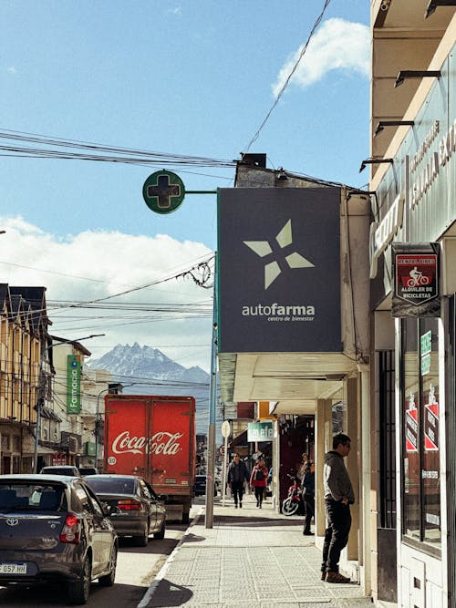 Traffic on the Street with the View of Mountains 