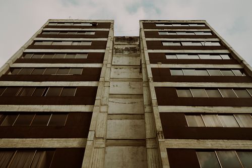 Free Low angle view of building exterior showcasing windows and sky in Mérida, Venezuela. Stock Photo
