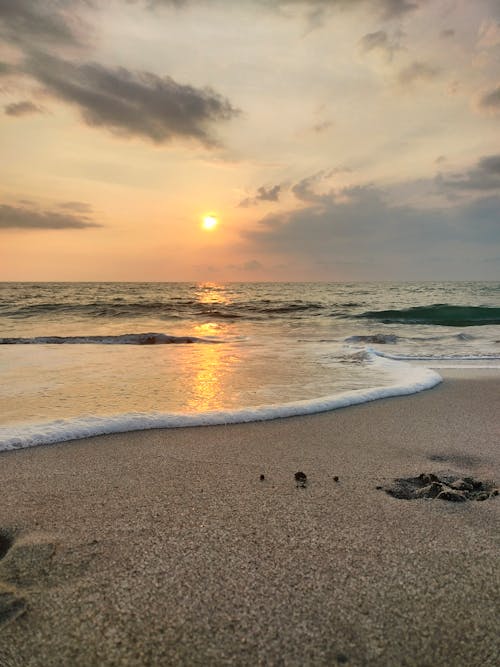 Foto profissional grátis de areia, costa, horizonte