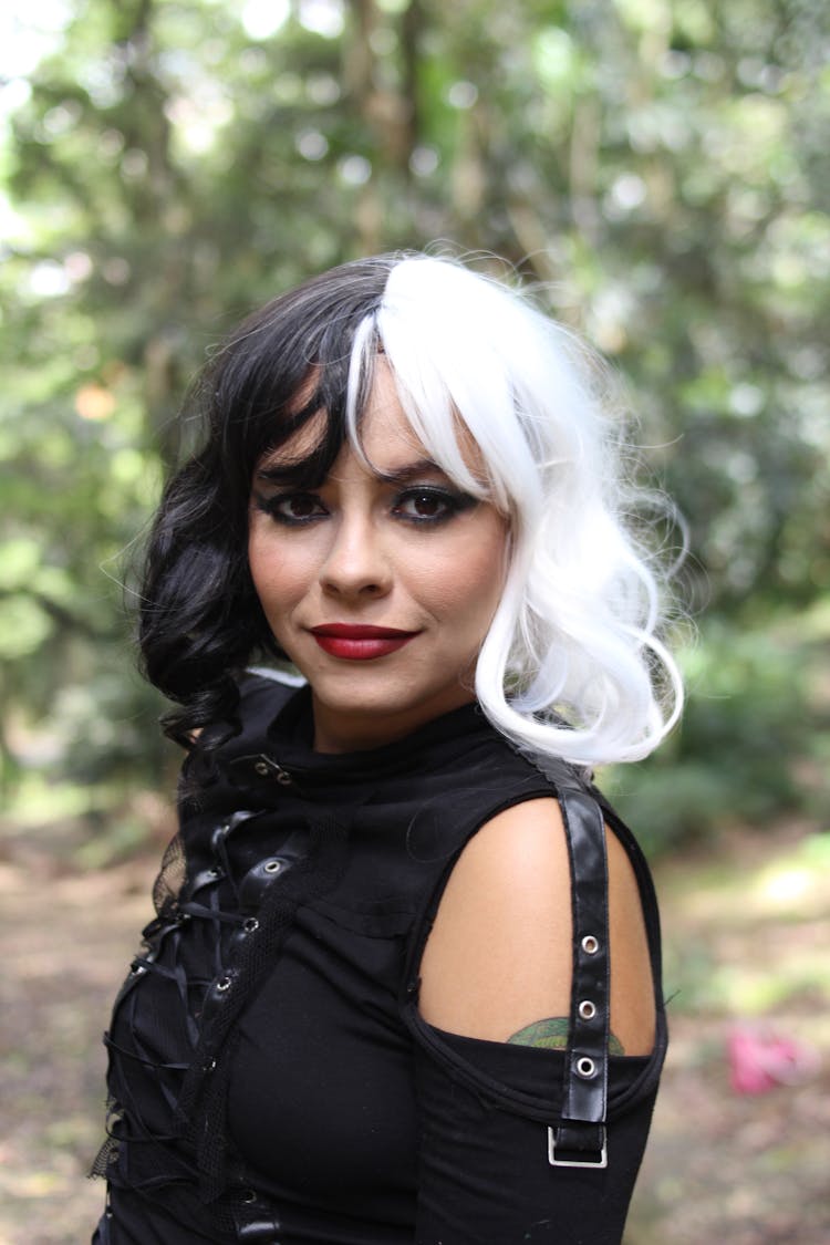 A Woman In Black And White Hair