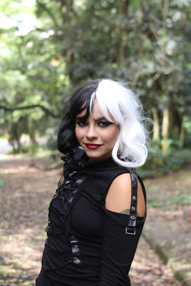 A Woman In Black And White Hair