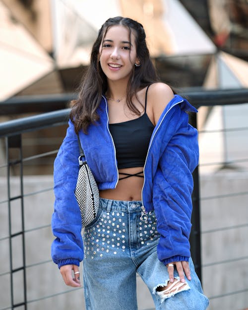 Smiling Girl Posing in Jacket