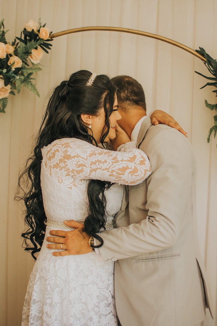 Bride And Groom Hugging 