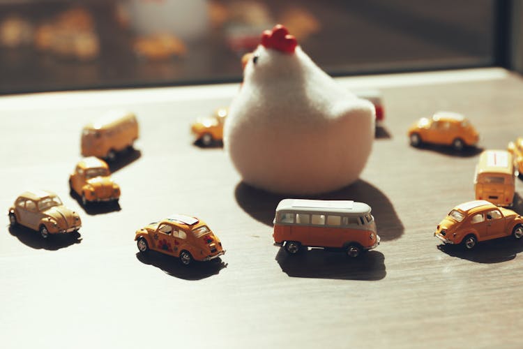 Toy Hen And Volkswagen Cars