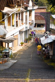 Charming village street scene depicting daily life in rural Indonesia. - Fotografer Sidoarjo
