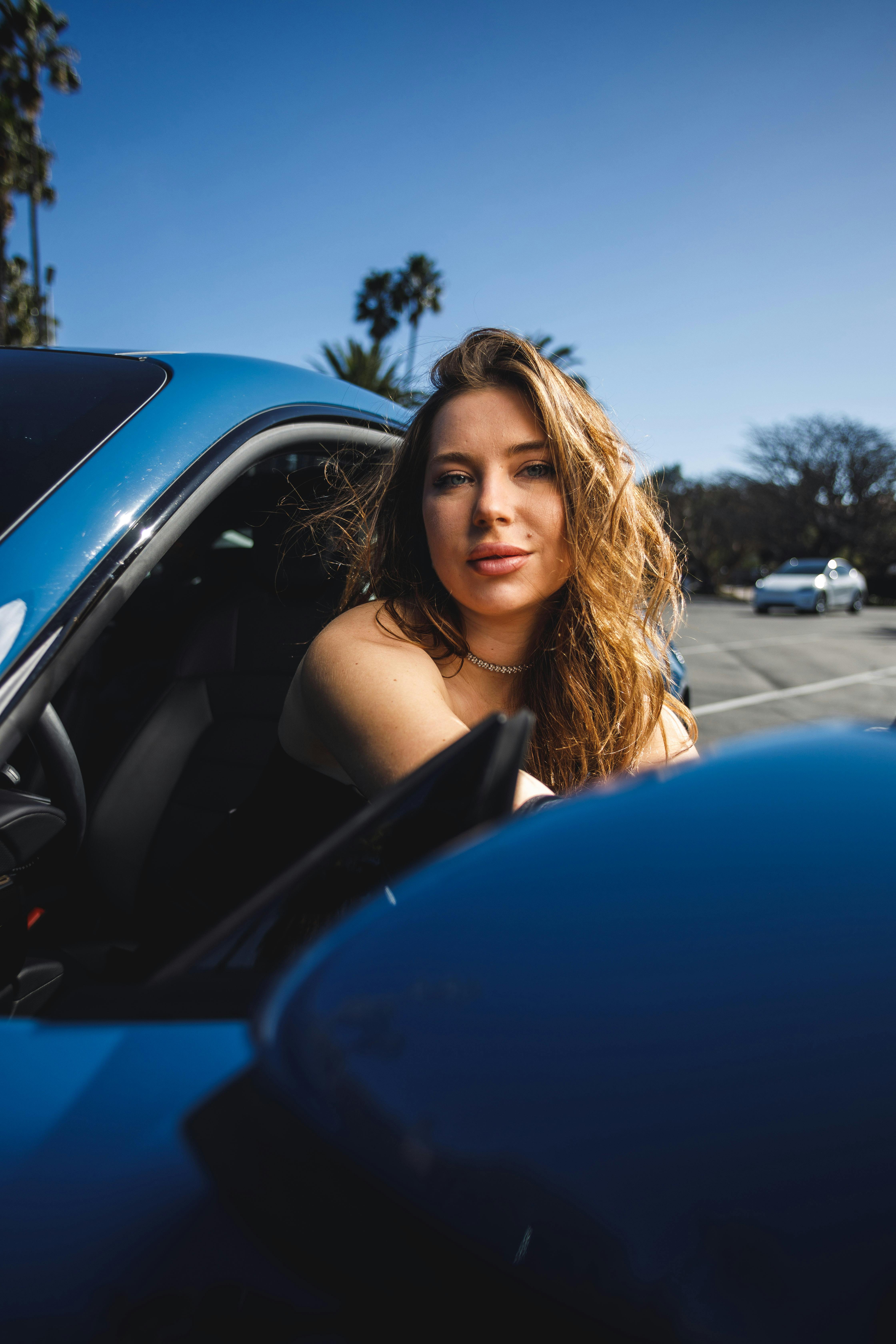 woman sitting in car