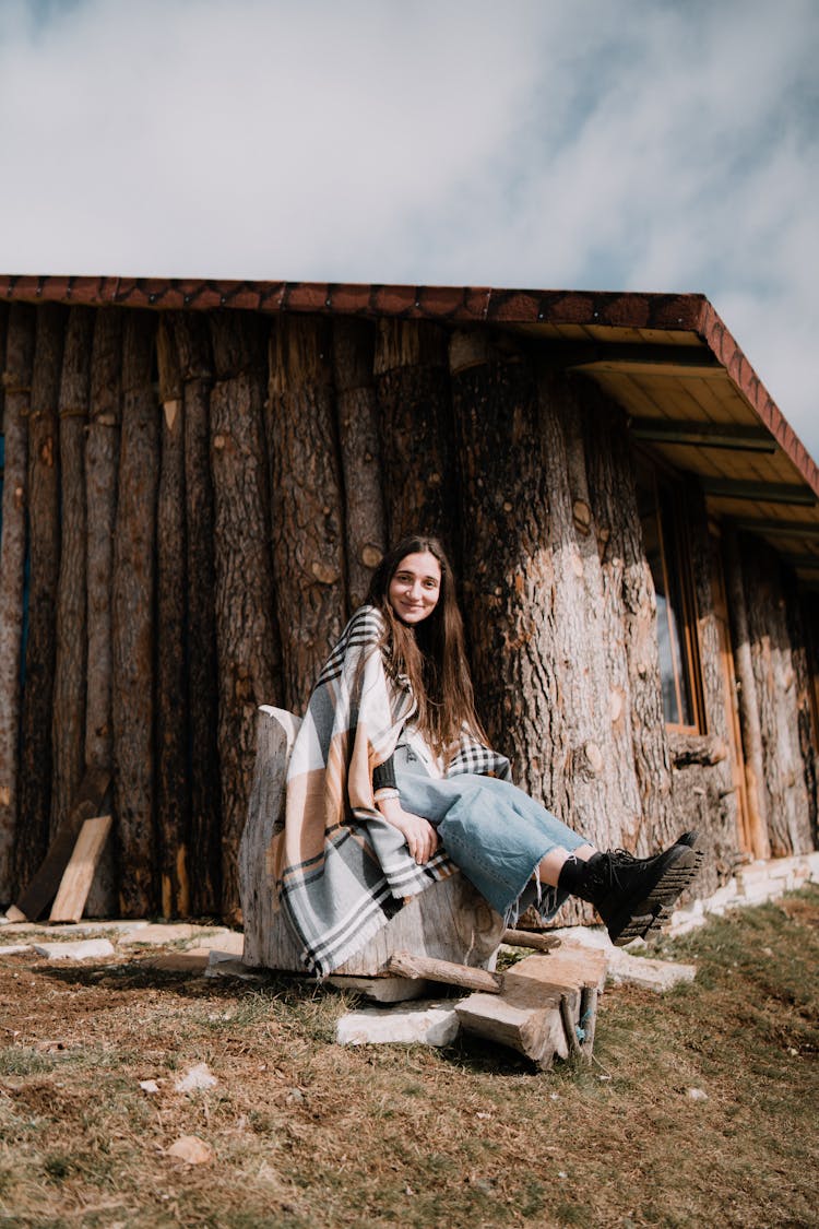 Woman Posing By Wooden Shed