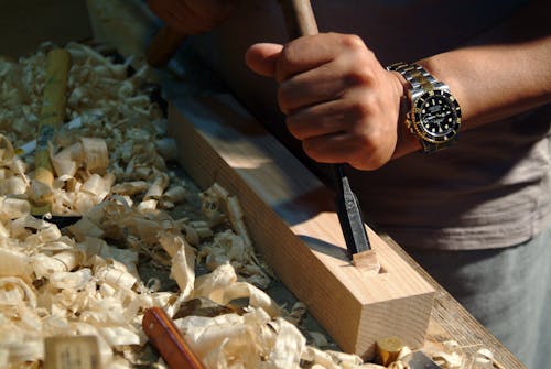 Close-up of Man Carving in Wood 
