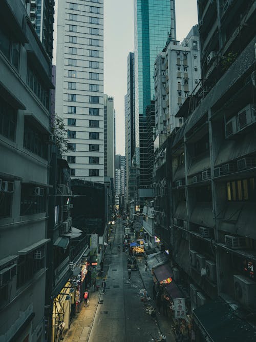 Dark Gray Alley at the Foot of Modern Skyscrapers