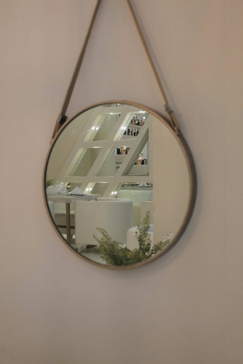 Minimalist Interior in a Round Mirror Reflection 