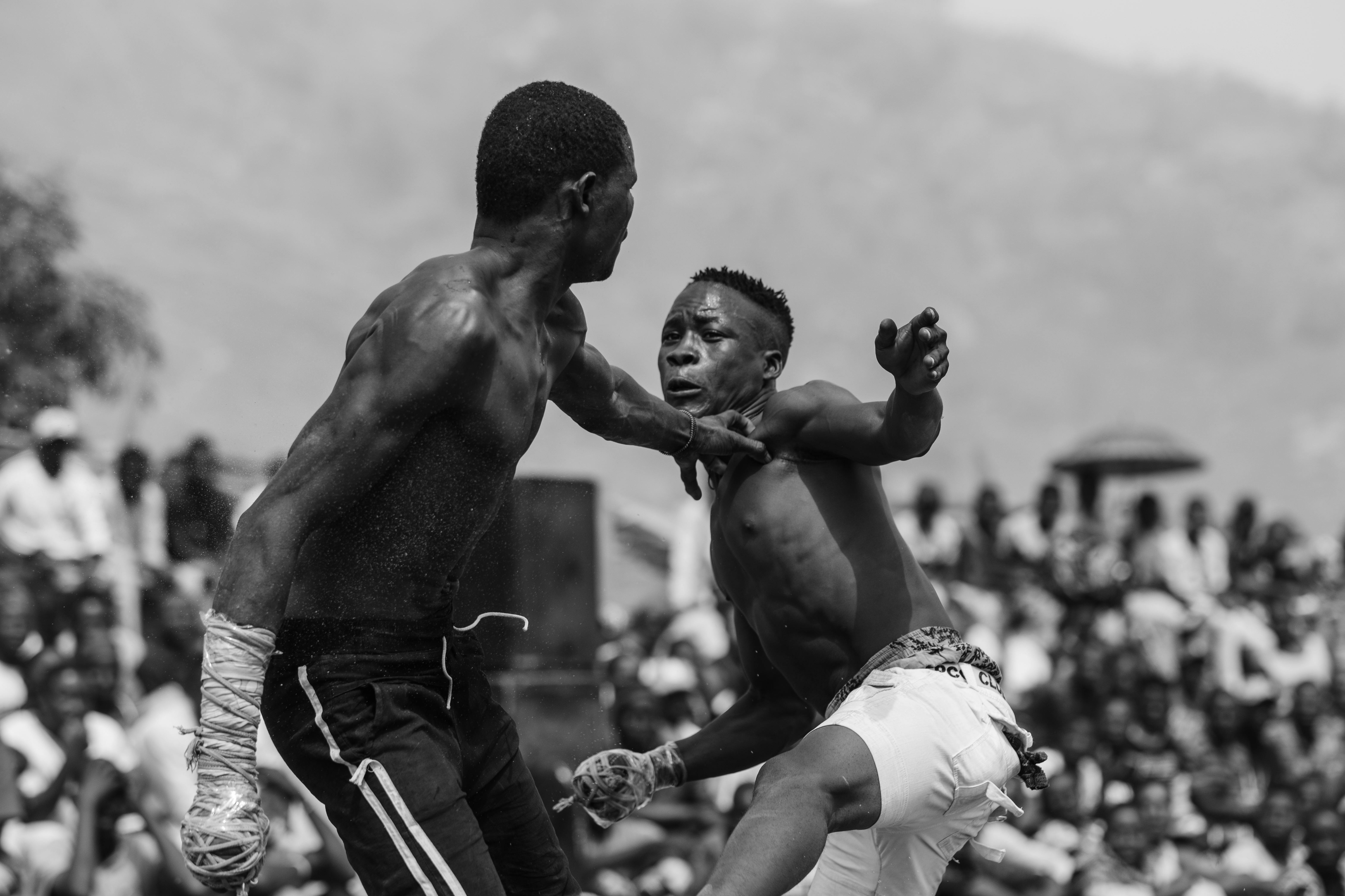 Spectators Watching Two Men Fight · Free Stock Photo