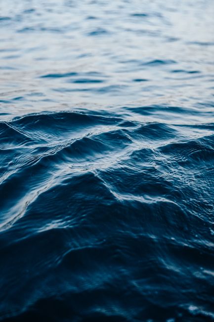 Blue ocean waves gently rolling. Perfect for sea-inspired designs and relaxation themes.