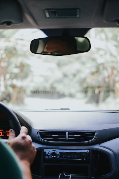 Man Hand in Car Interior