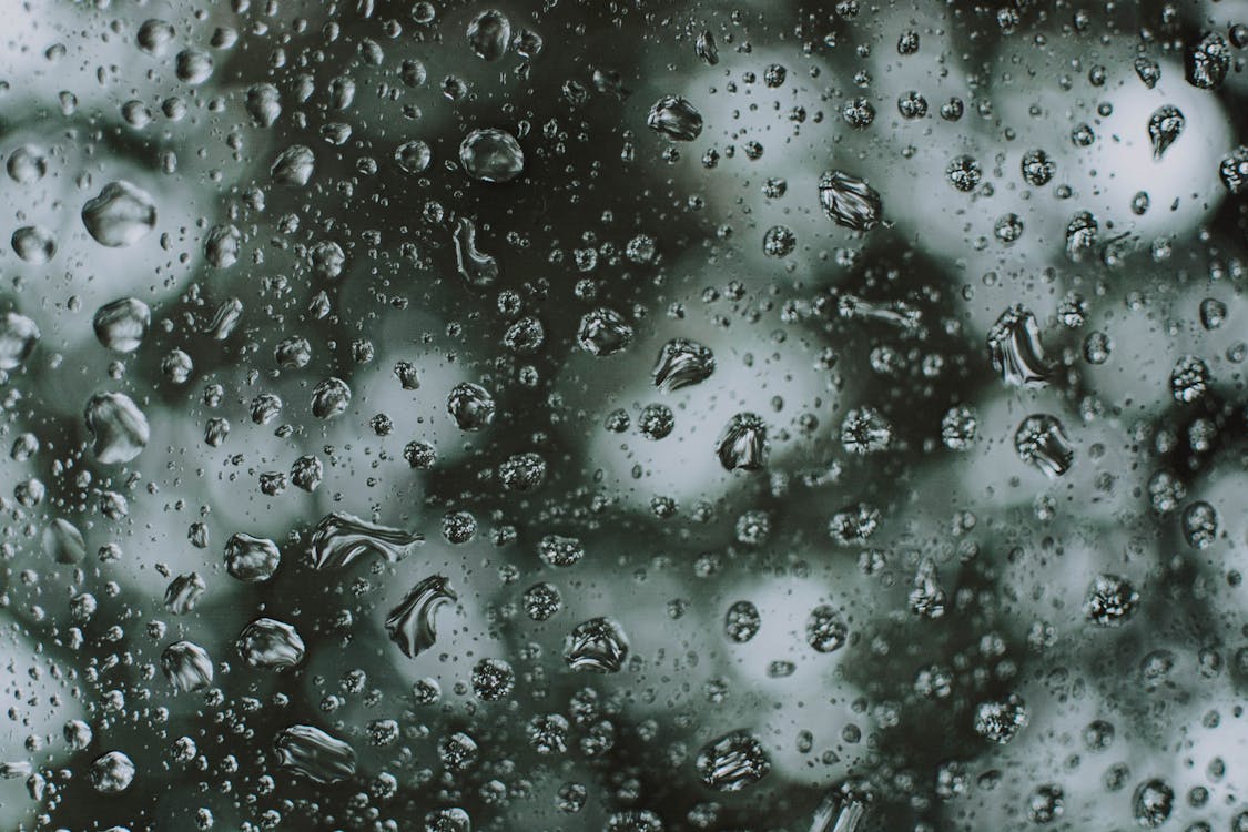 Close-Up Photo of Droplets On Glass