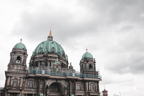 Facade of the Berlin Cathedral under a Cloudy Sky, Berlin, Germany 