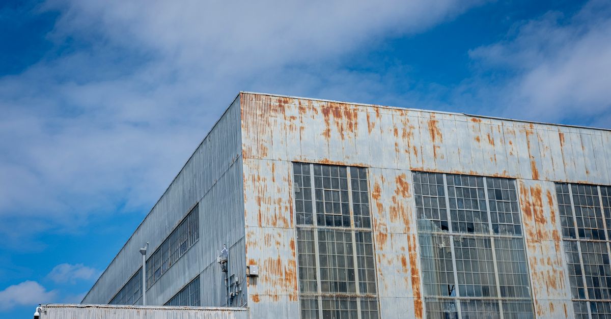 Rusty Building Wall · Free Stock Photo