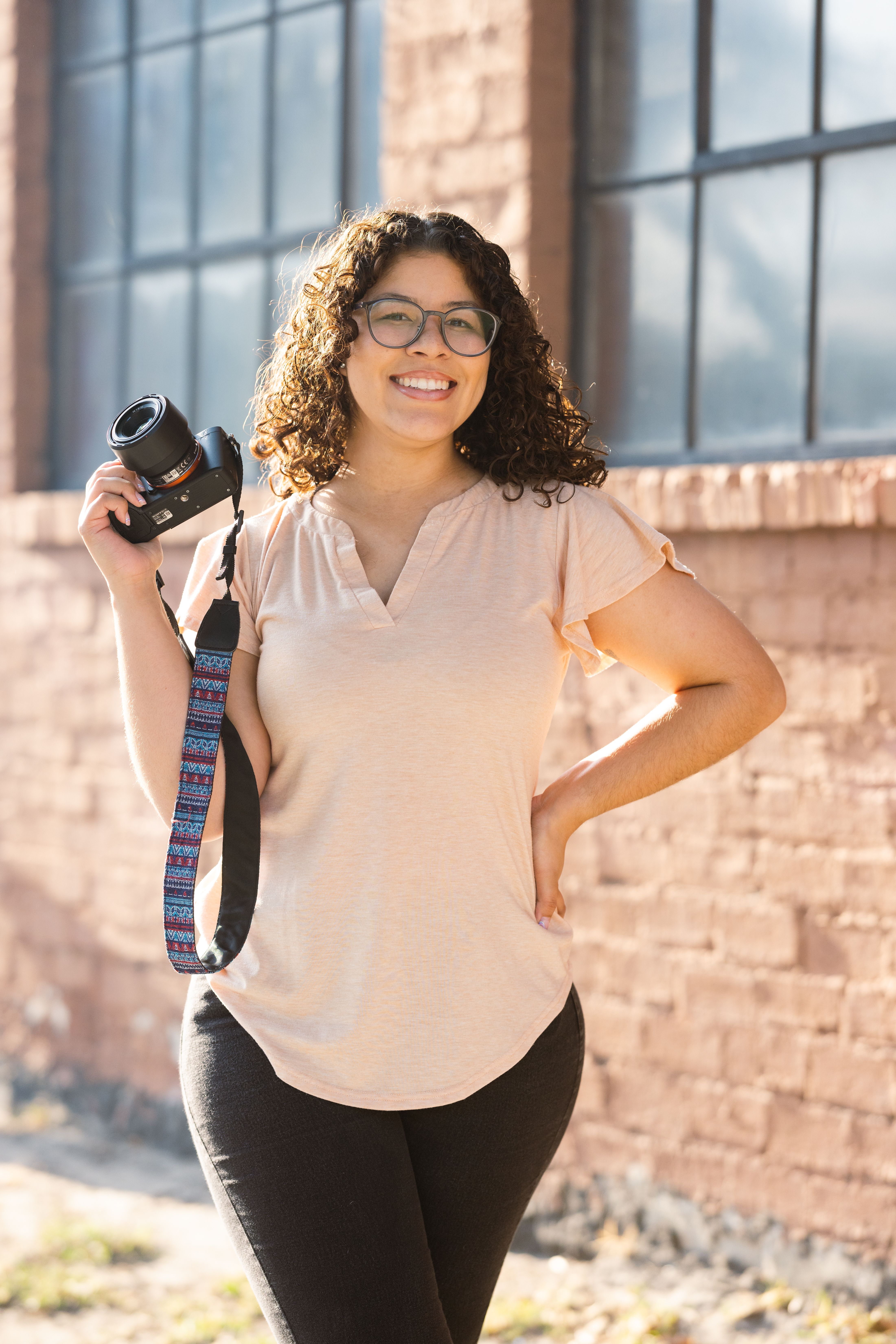 Portrait of a Woman with a Camera · Free Stock Photo