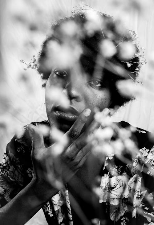 Woman behind Flowers in Black and White