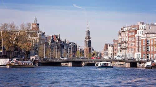 The Munttoren seen from the Amstel River in Amsterdam, the Netherlands 