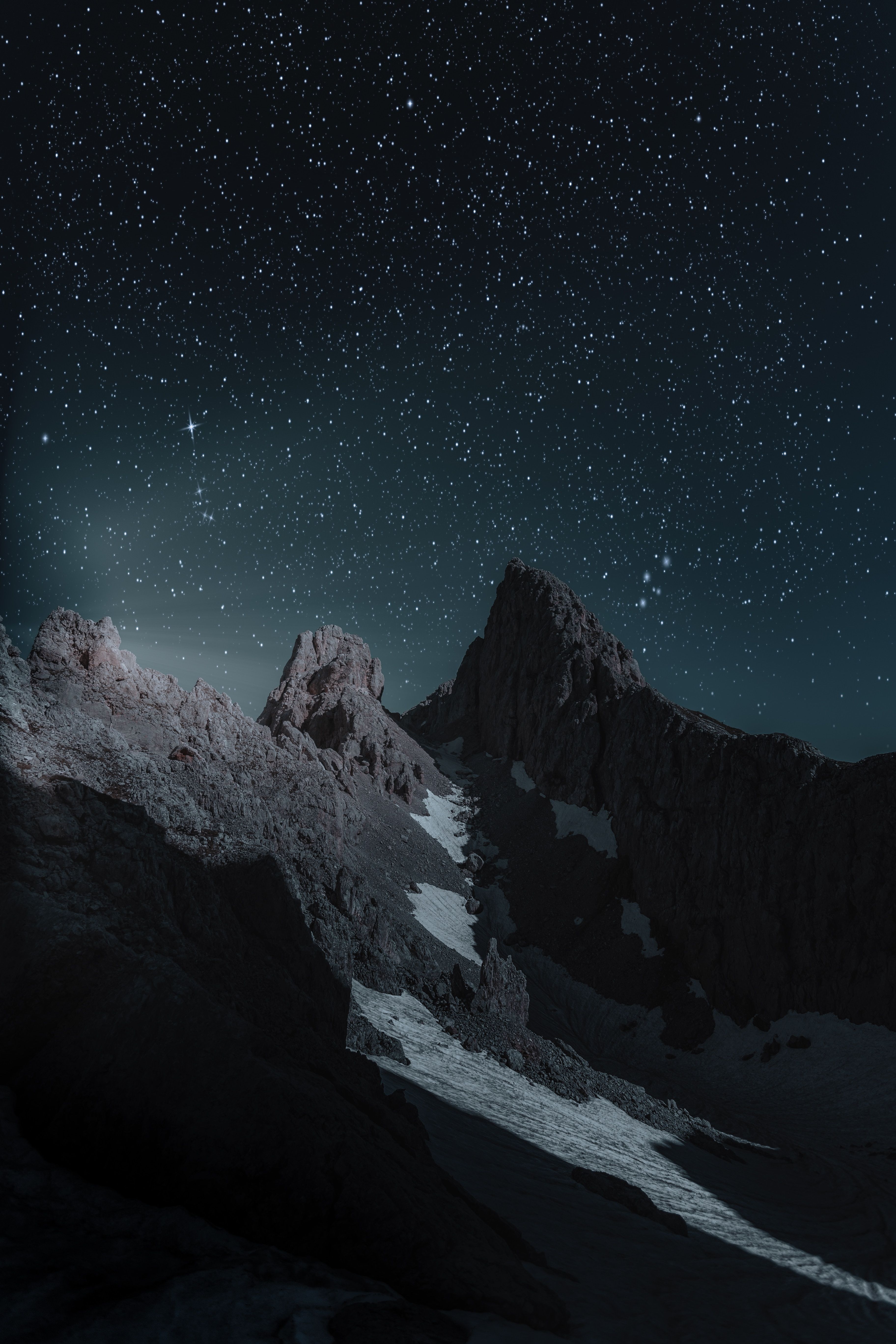 The dark ridge before moonrise