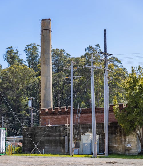 An Industrial Building with a Chimney 