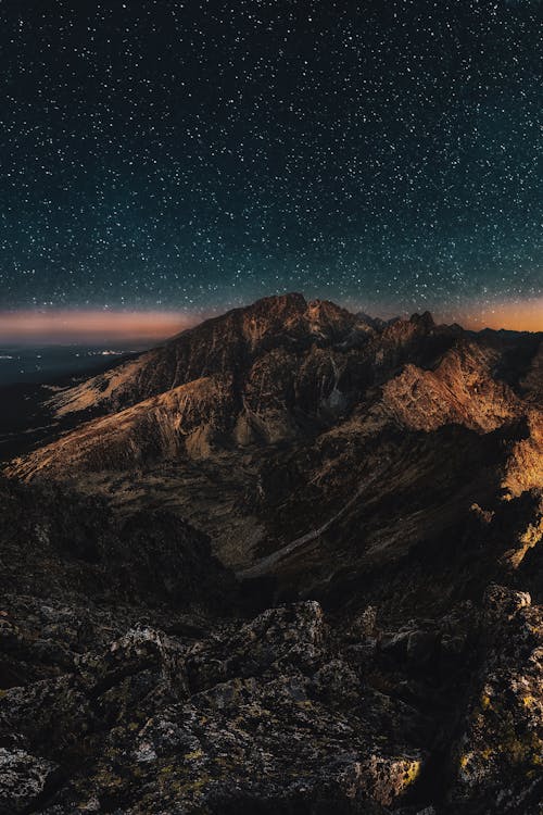 Free Mountain At Night Under A Starry Sky Stock Photo