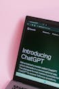 Laptop Displaying ChatGPT Introduction Screen