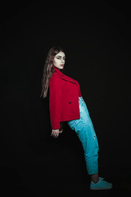 Model Posing in Red Coat