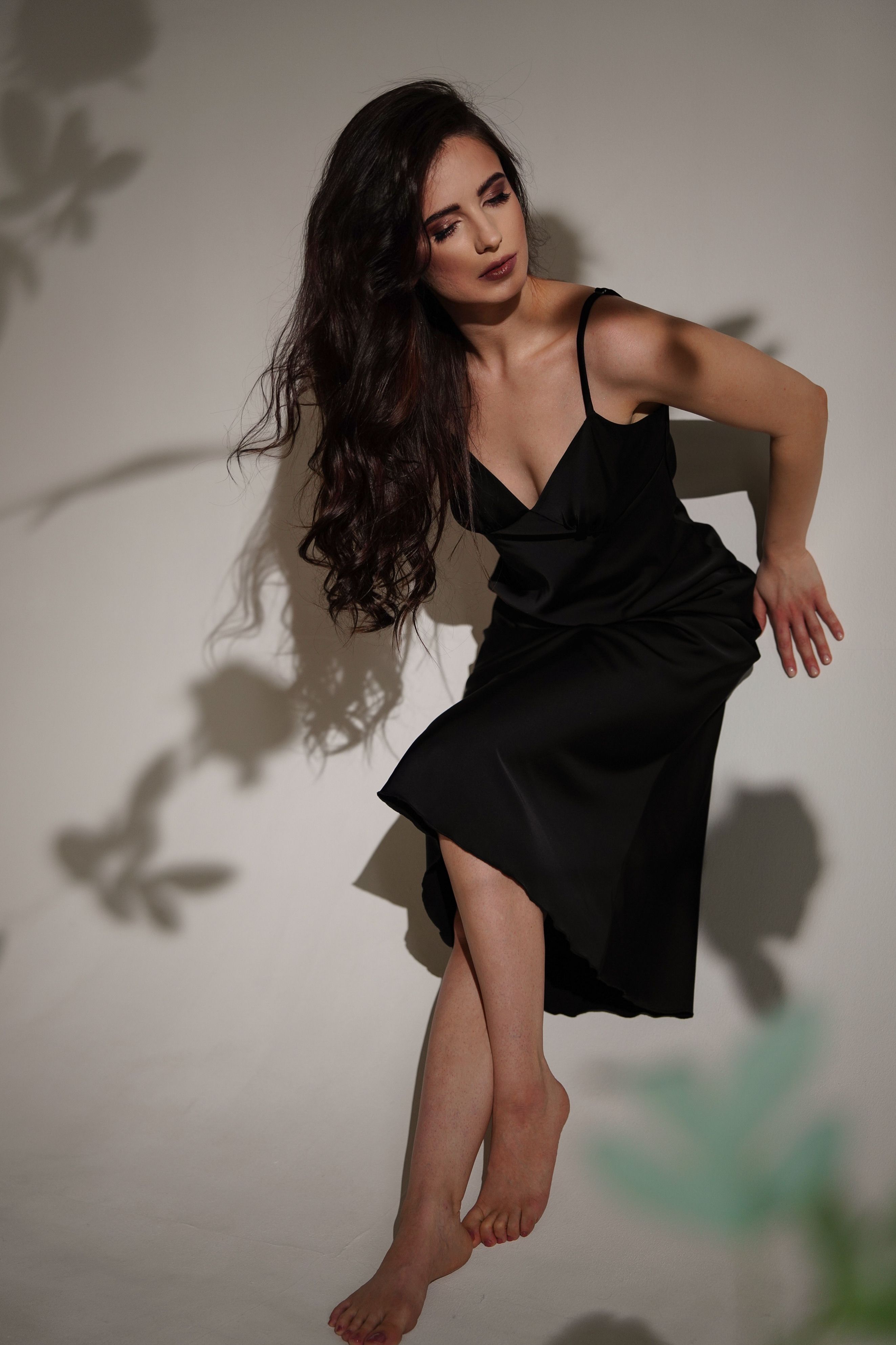 Brunette Woman in Black Dress  Free Stock Photo