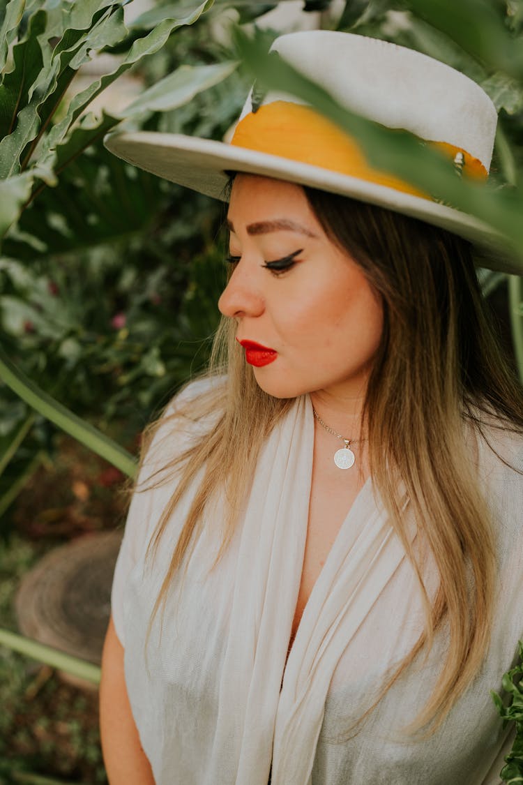 Portrait Of Blonde Woman In Hat