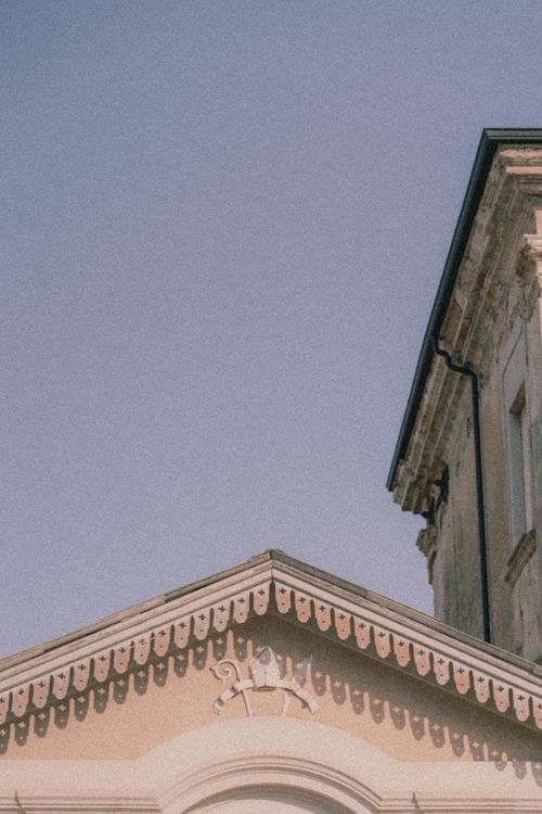 Free Close-up view of historical building architecture in Palmi, Calabria, Italy under a clear blue sky. Stock Photo