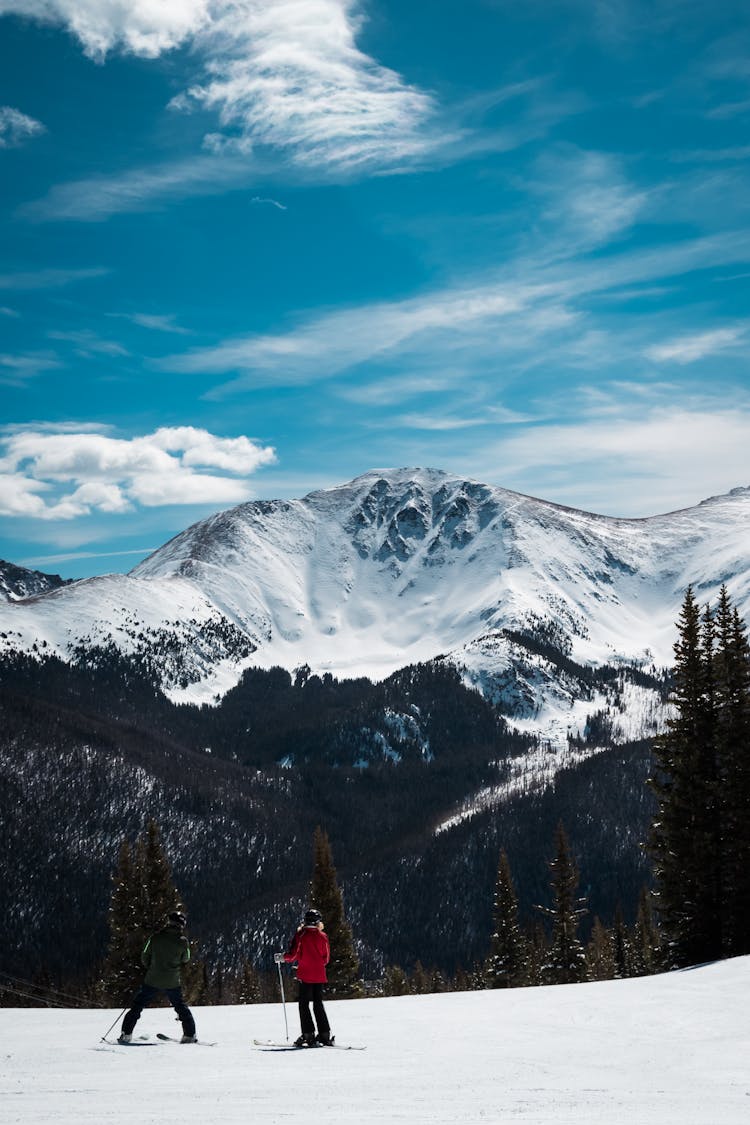 People Skiing On Winter Vacation