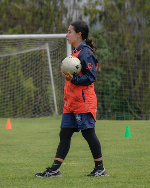 Young Woman at a Soccer Training 